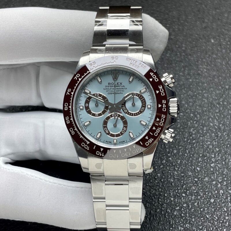 Macro view of the VSF Daytona 116506 Tungsten Heavyweight ice blue dial, showing the solid white gold markers, chestnut brown Cerachrom bezel, and DD4130 alignment.