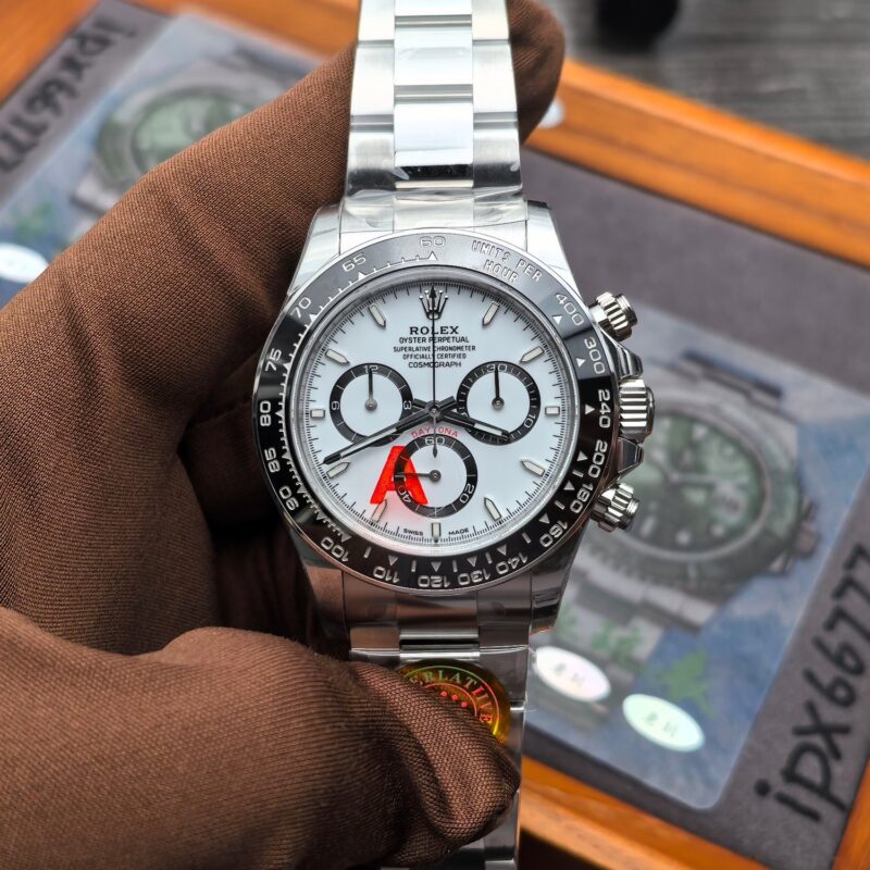 Macro view of the VSF Daytona 126500LN Panda dial, showing the reference-specific slim markers, 6 o'clock Coronet, metal-edged ceramic bezel, and DD4131 alignment.
