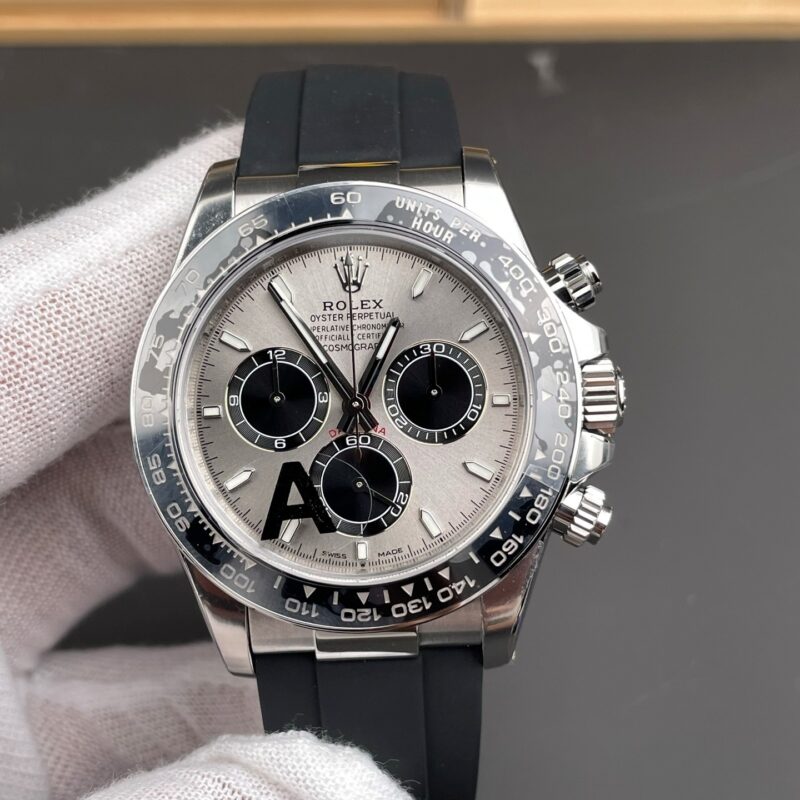 Macro view of the VSF Daytona 126519LN-0006 Silvered dial, showing XRF-verified solid 18K white gold dial furniture, warm WG case tone, 126-series metal-edged ceramic bezel, and precise strap-to-case integration.